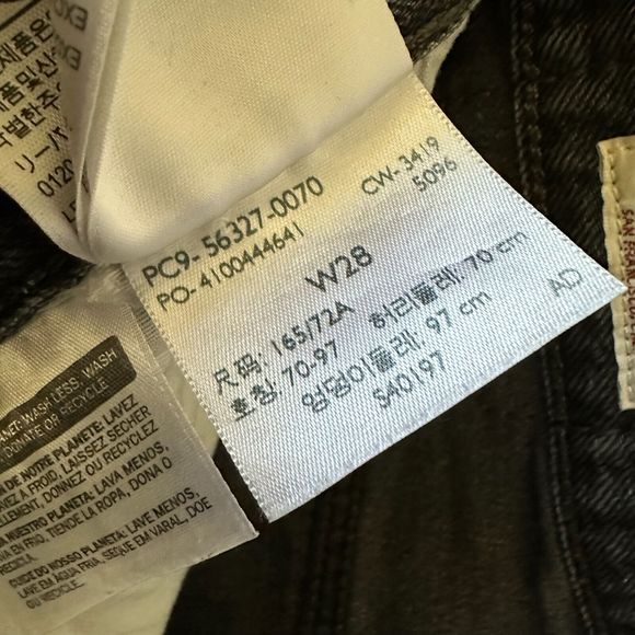 LEVI'S 501 High-Rise Cut-Off Raw Hem Jean Shorts in Washed Black - Picture 10 of 11